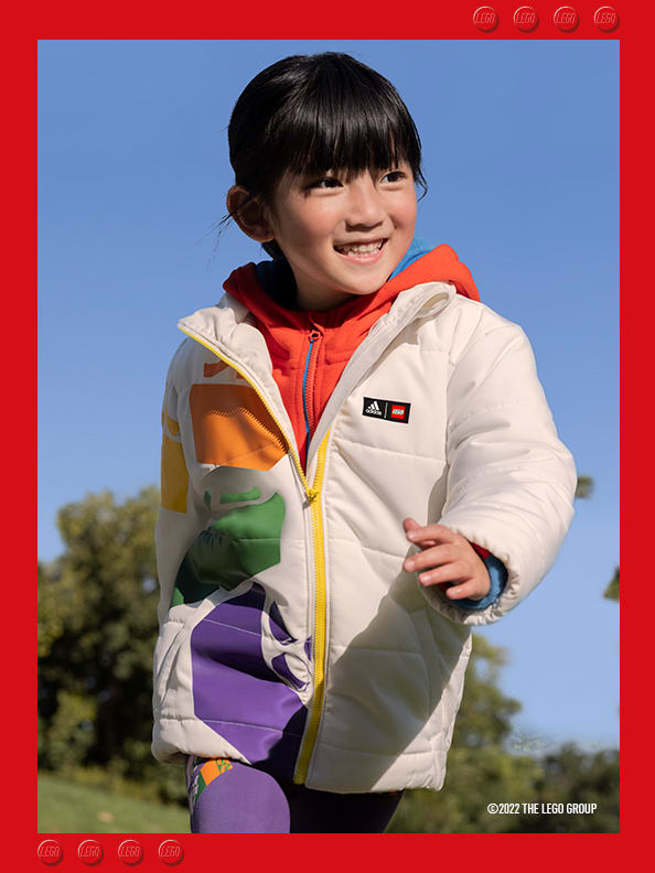 Smiling girl in white Winter jacket