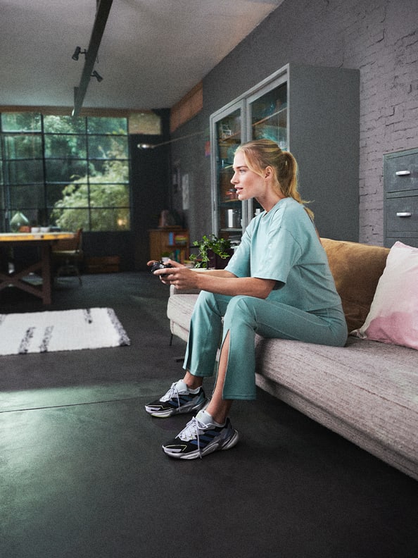 An image collection of a women doing her workout and her relaxing afterwards at home.