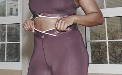 Image of a model wearing plum bra and tights co-ord