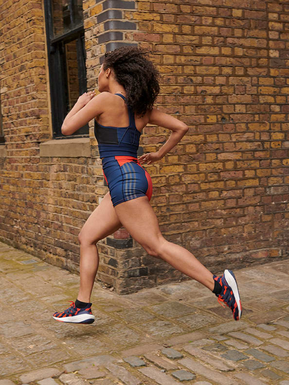 Woman wearing adidas x Marimekko clothing