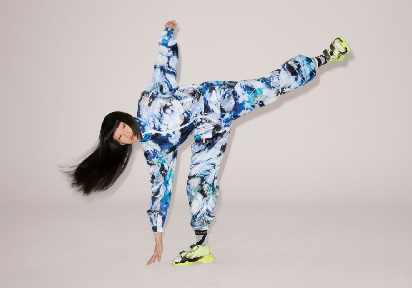 Model wears various pieces from the Adidas by Stella Mcartney Truenature collection