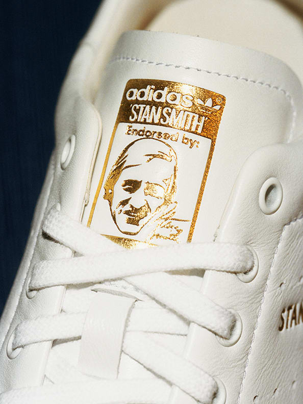 Close-up of a shoe label on a Stan Smith shoe showing Stan Smith logo