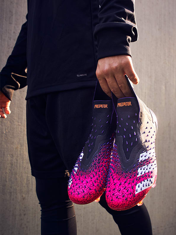 Lifestyle image featuring the Predator Boots.
