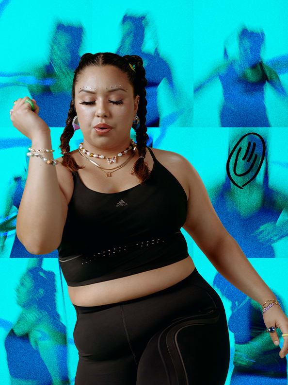 Woman in workout gear working out, in front of a bright blue background covered with smiley graphics.