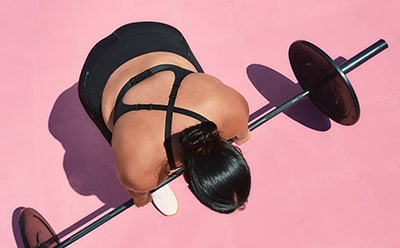 Model wears adidas bra