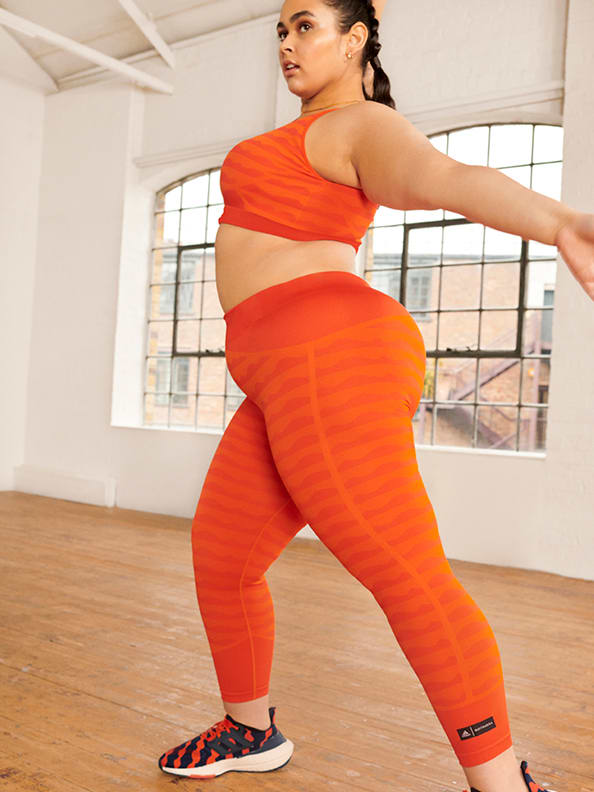 Woman wearing adidas x Marimekko clothing