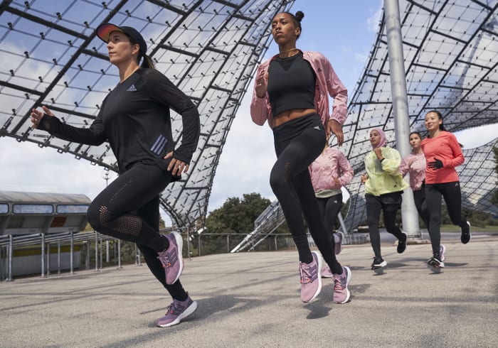 Group of women running with the new Ultraboost 22 running shoe
