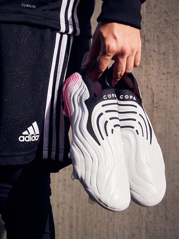 Lifestyle image featuring the Copa Boots.