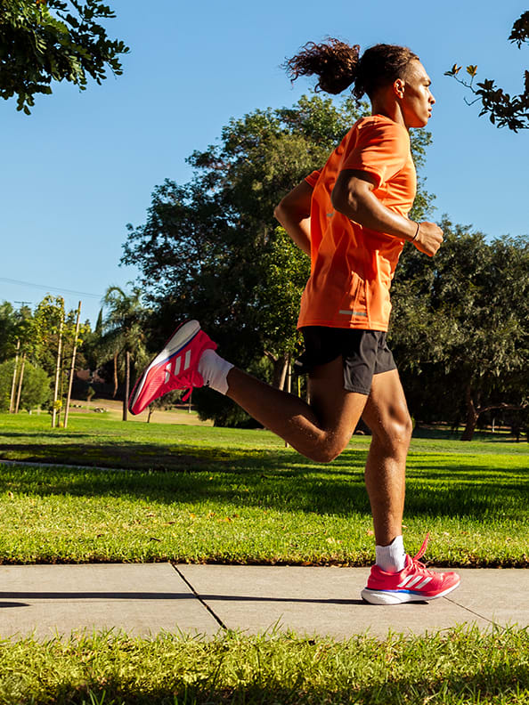 Image of a man runner in the park.
