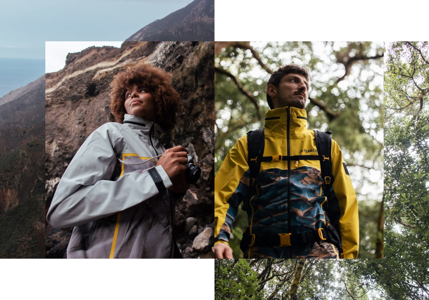 A woman and a man in nature wearing the adidas TERREX x © National Geographic collab jackets