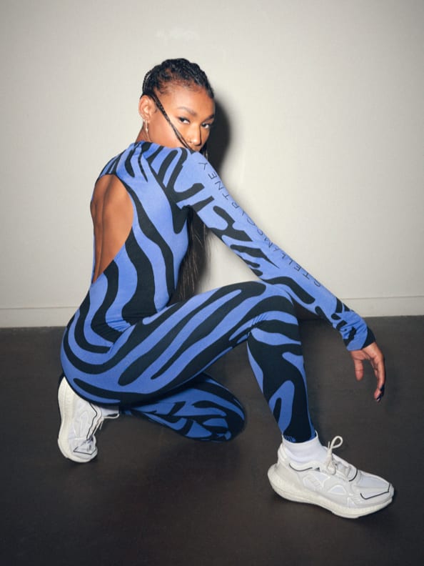 Nia Dennis wears the Agent of Kindness collection from adidas by Stella McCartney. Spring/Summer 22