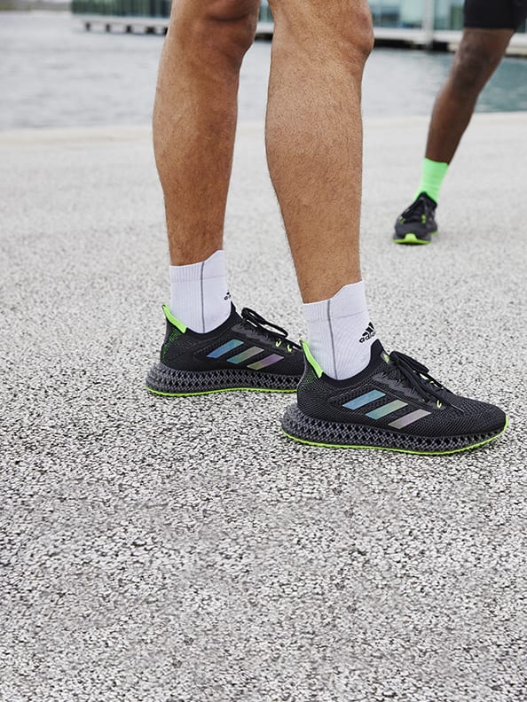 Close up of person running with the new adidas 4DFWD running shoe.