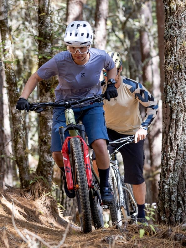 Samantha Soriano and Darren Berrecloth in action cycling.