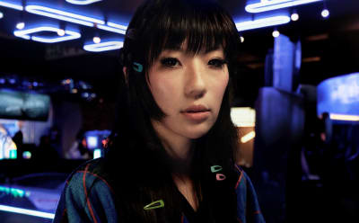 A woman is photographed wearing adidas Originals.