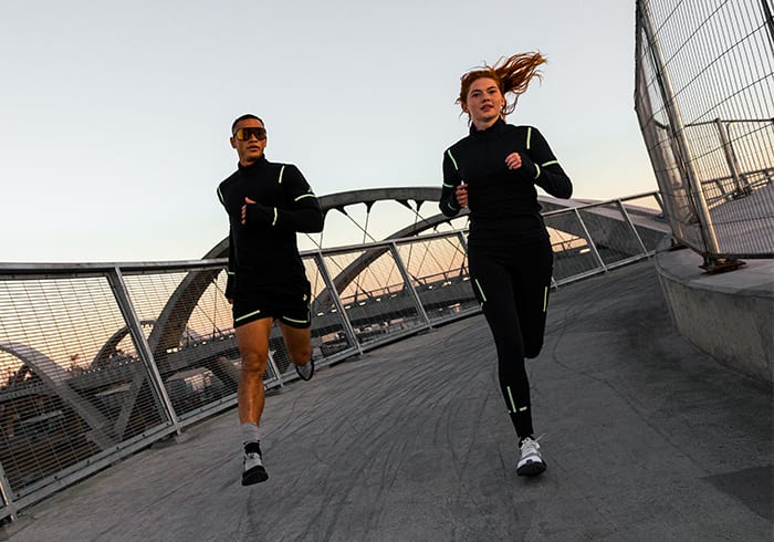 Two models running in a urban landscape