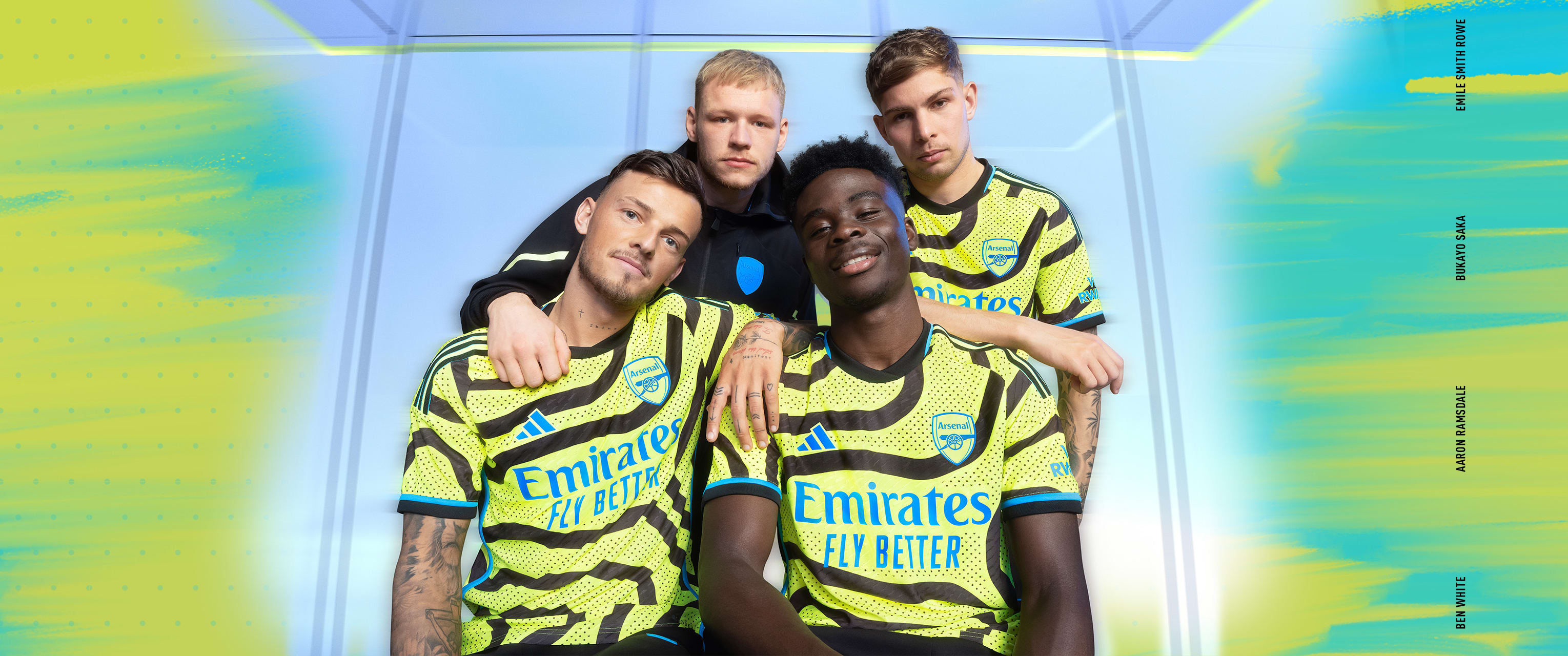 Visual featuring a group of Male Arsenal pro players wearing the new 23/24 Arsenal Away kit.