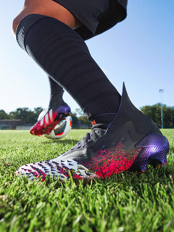 Action image featuring the Predator Boots.