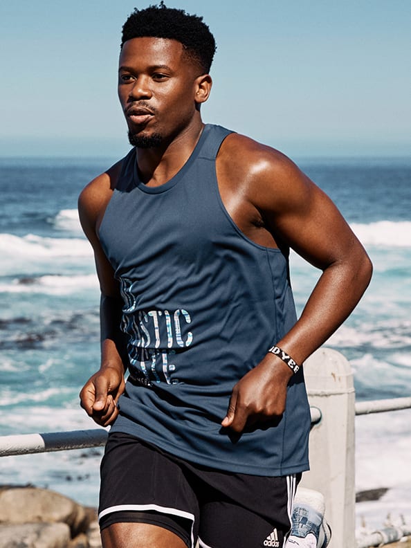 A man is warming upto get ready for Run For The Oceans