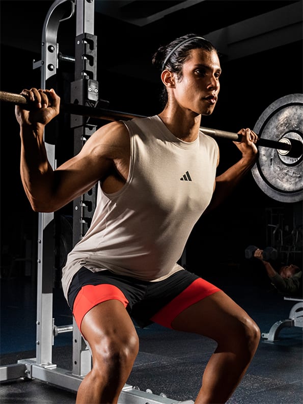 Male model working out in adidas training collection
