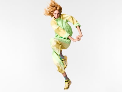 Model wearing head to toe adidas by Stella McCartney SS25 apparel.