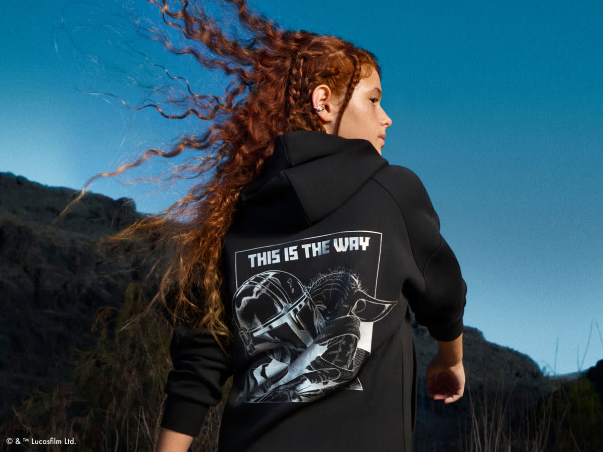 Close up of child’s back from behind, wearing the  adidas | Star Wars: The Mandalorian™ collection