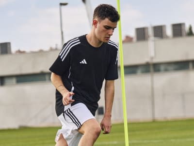 Male player during practice wearing F50 boots