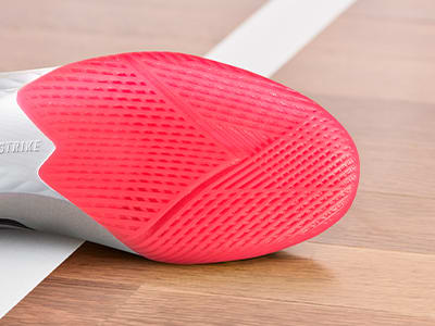 An outsole of an adidas football boot made to be played indoors