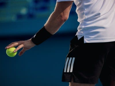 Close-up shot of a player wearing the tennis collection