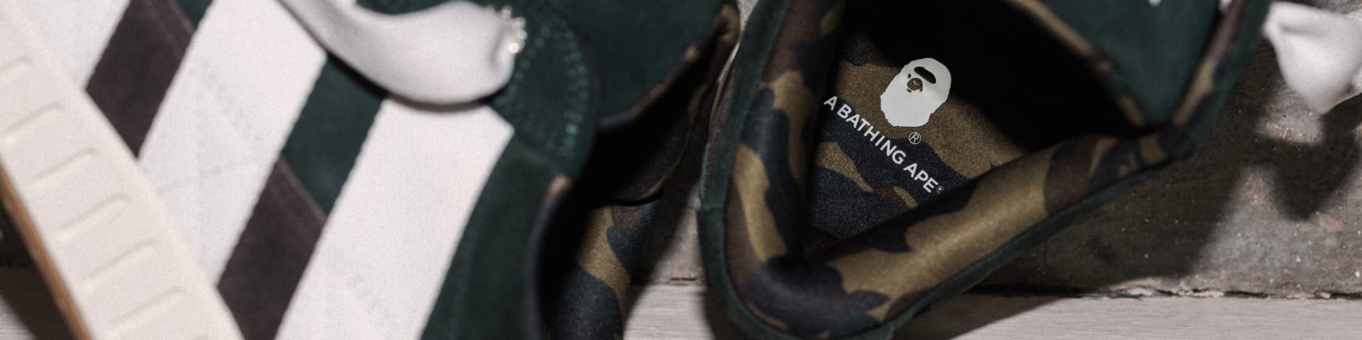 The adidas N x BAPE® is photographed from top down to show the inside and side of the shoe.