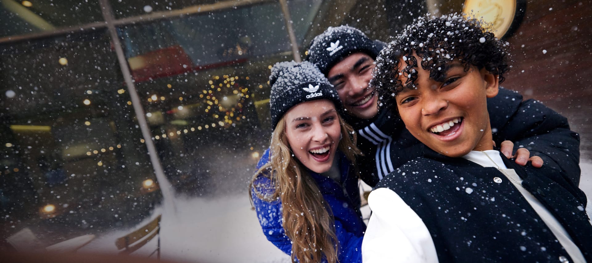 adidas-three-models-posing-snow-winter-apparel-fall-winter-2023