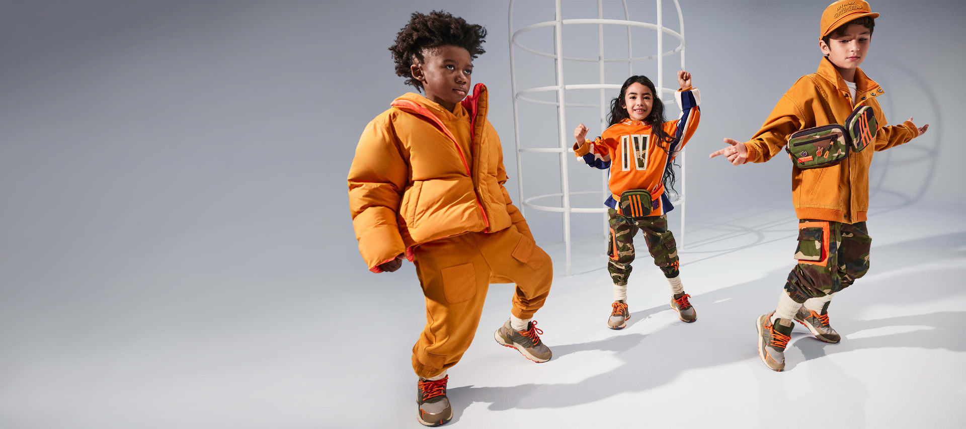 A group of young models are photographed in the adidas x IVY PARK collection.
