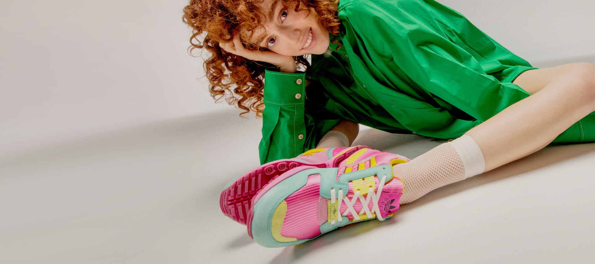 Models wear the adidas x Gucci collection in campaign images.