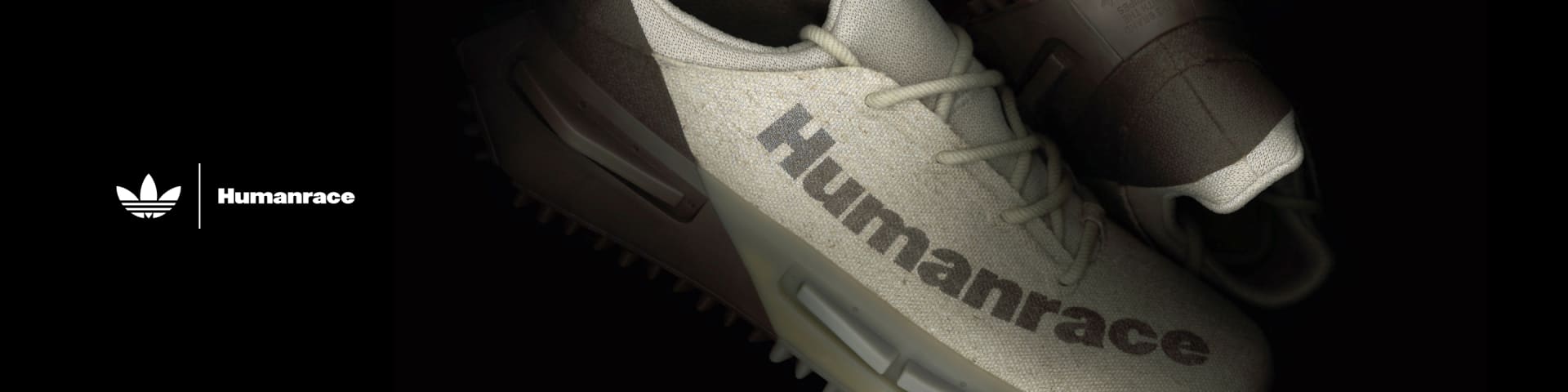 Close zoom of NMD S1 MAHBS by Pharrell shoes in earth tones