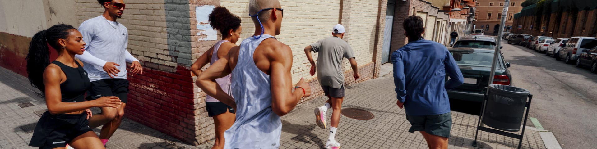 Image of runners outdoors wearing adidas apparel and Ultraboost 5.
