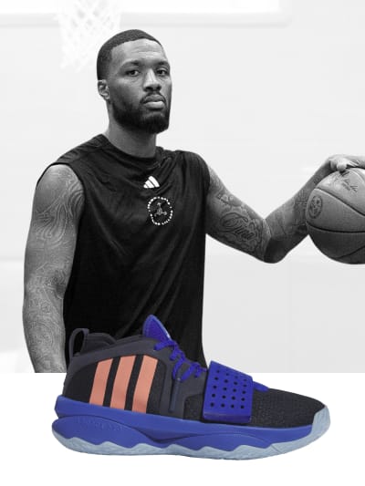 Black-and-white image of Damian Lillard holding a basketball, with black and white shoe superimposed in front of image.