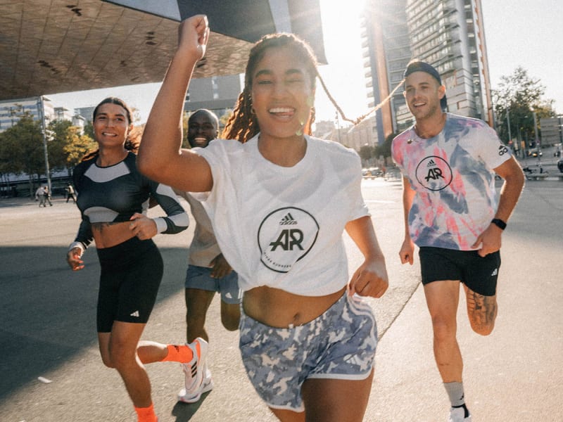 Group of Adidas Runners run together as a community.