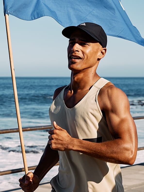 A man is warming up to get ready for Run For The Oceans