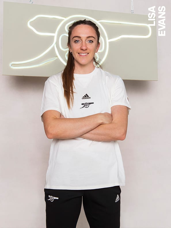 Male and female players wearing the Arsenal Travel Collection