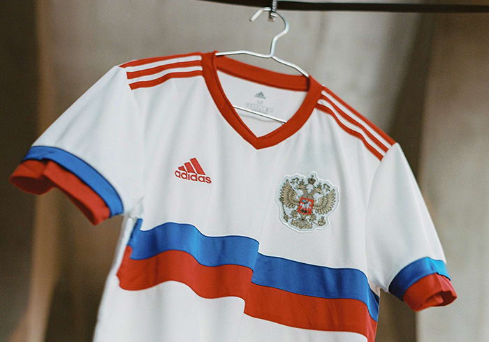 The new Russia Away jersey is shown here. Showing off the white, blue and red of Russia's flag, this adidas football jersey offers a taste of home for Russia's players when they play away.