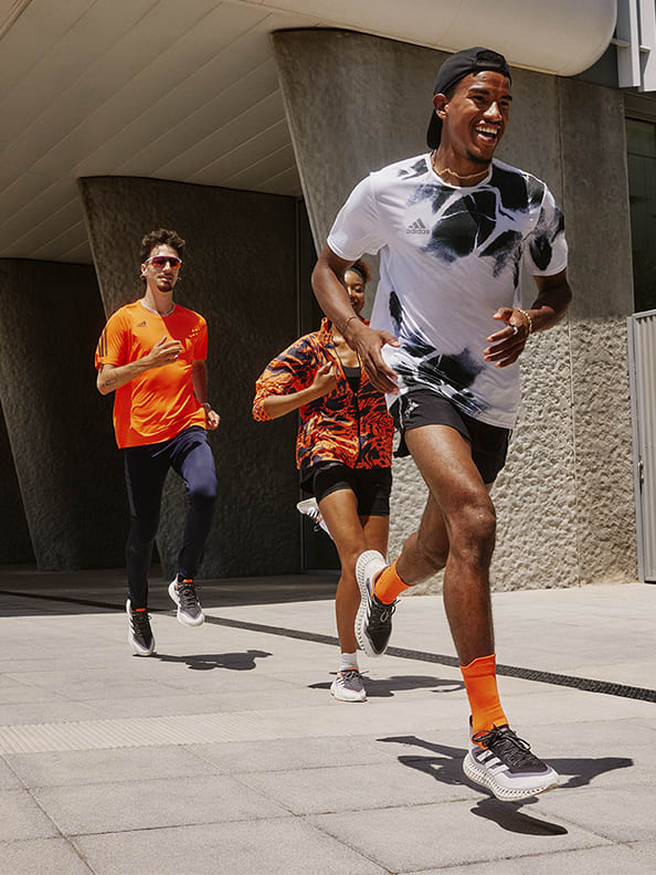 Three people running