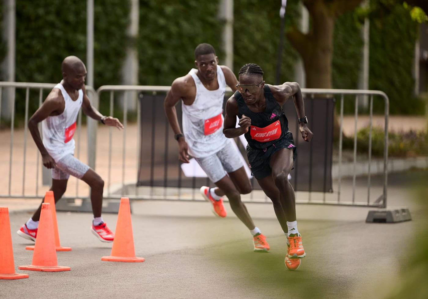 Image showing male racers competing in a marathon. They are all wearing Adizero Adios Pro 3 shoes.