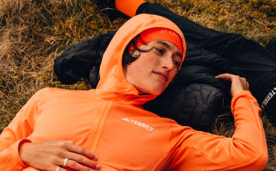 Female wears pieces from the Terrex Adventure Wardrobe FW24 Collection