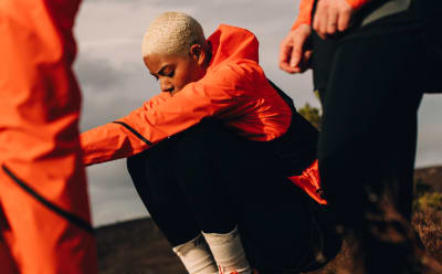Female wears pieces from the Terrex Adventure Wardrobe FW24 Collection