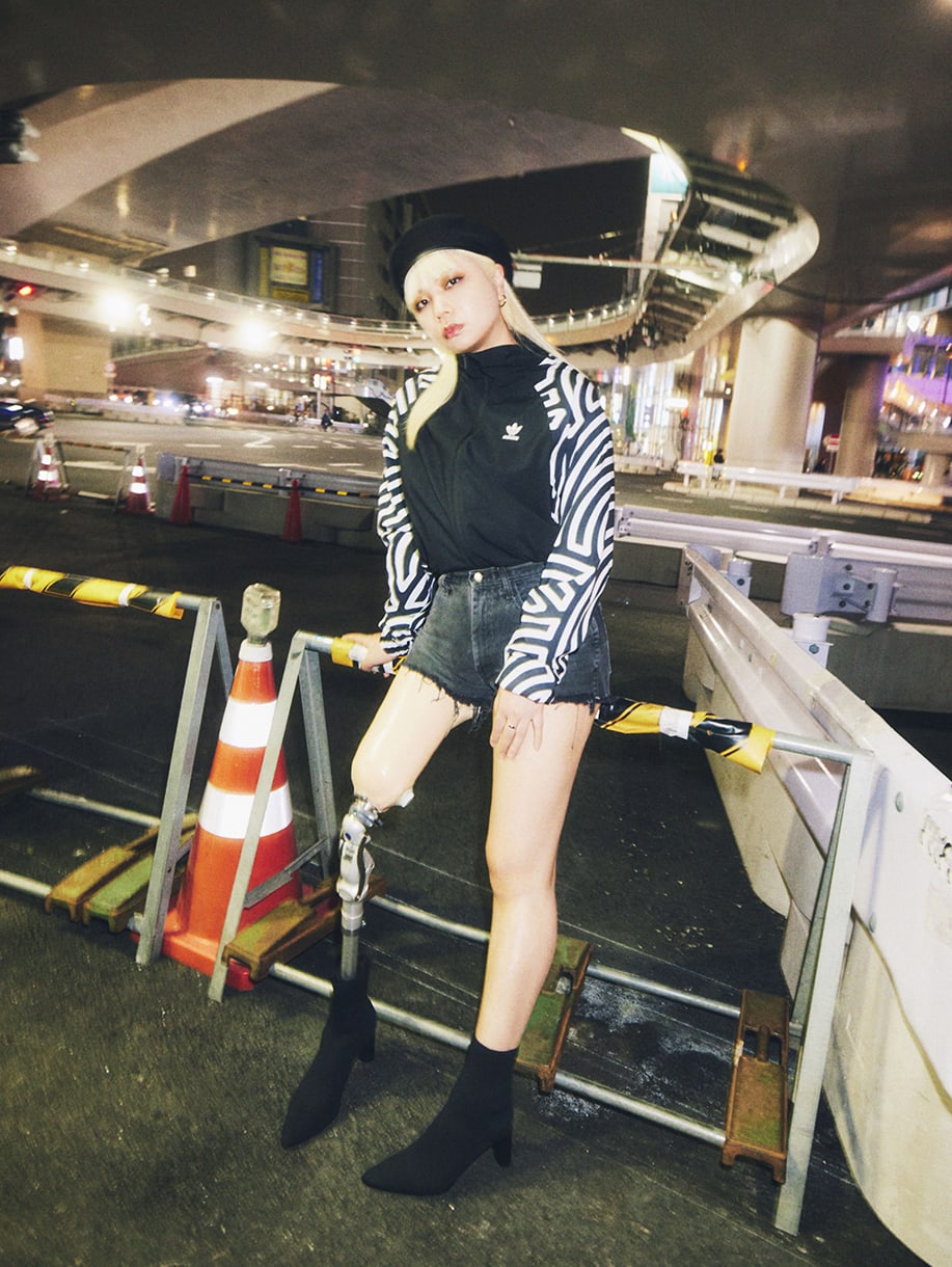A young woman wearing items from HIROKO TAKAHASHI COLLECTION.