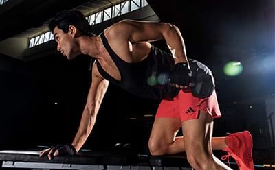 Male model working out in adidas training collection