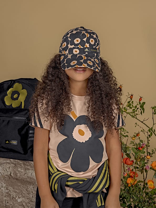 Child wearing adidas x Marimekko clothing