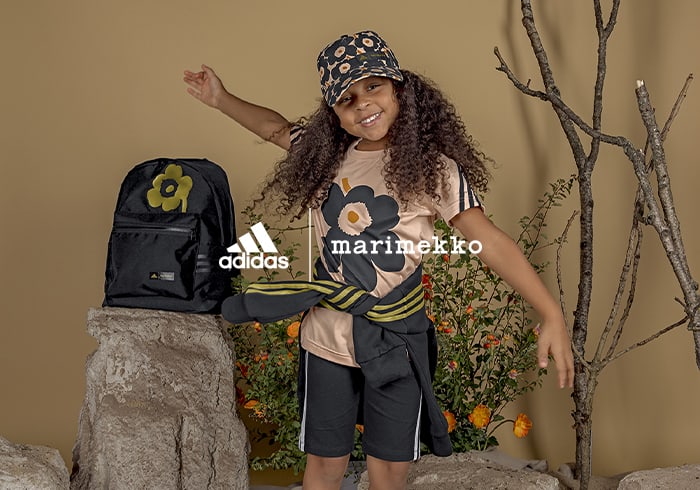 Child wearing adidas x Marimekko clothing