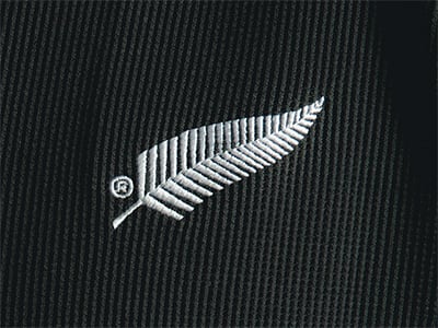 Close up on fern on New Zealand rugby jersey