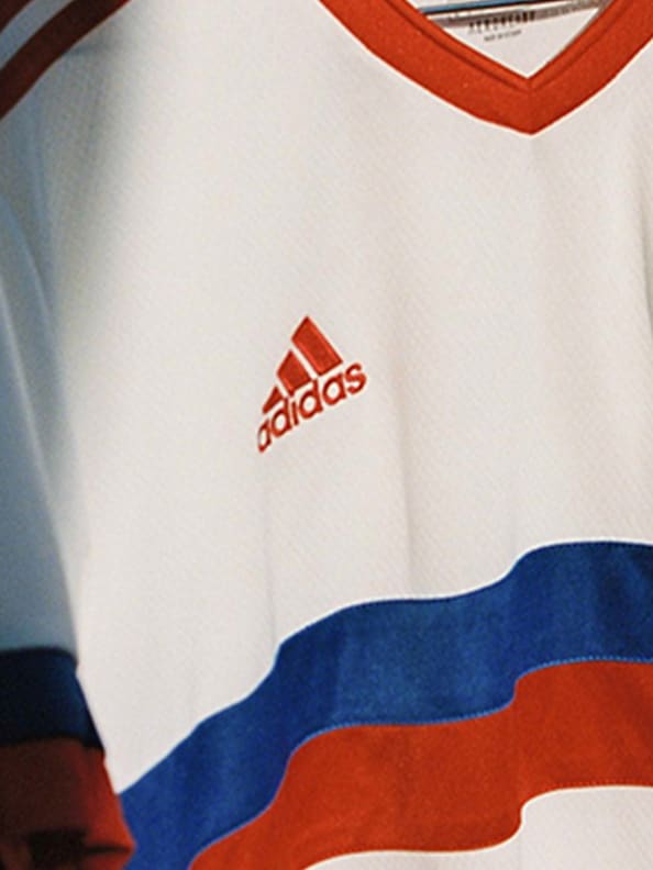 Close up of the team badge, woven into the chest.