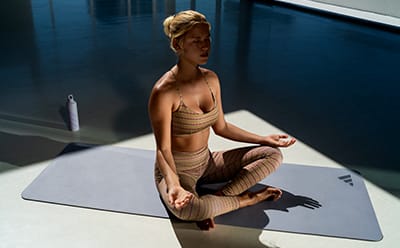 Model wearing adidas Bras and Leggings collection